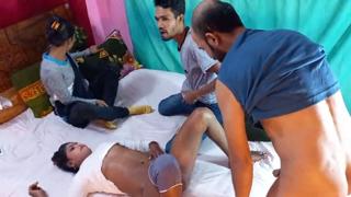 Two African women get their wild desires fulfilled in a group sex session
